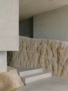 Concrete steps and walls in a modern interior design setting.