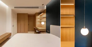 A modern minimalist bedroom featuring LED lighting, wood and fabric finishes, and a comfortable sleeping area with a white be