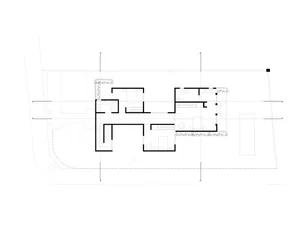 Floor plan of a modern residential building with concrete materials.