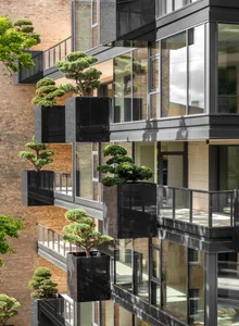 Modern architecture building with glass, steel, and brick exterior.