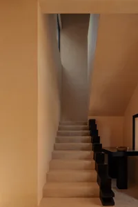 Concrete staircase with minimalist design elements in an interior setting
