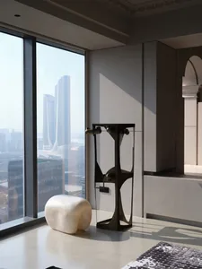 A modern living space featuring glass walls and a mixed-media sculpture.