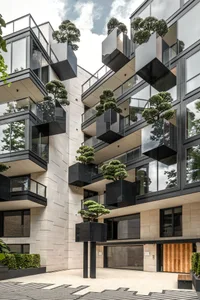Modern residential apartments featuring concrete, glass, and stainless steel materials.
