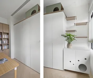 White minimalist cabinets in a modern residential interior setting.