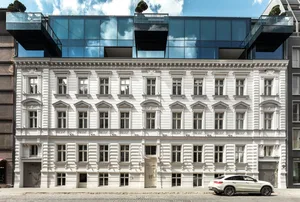 Modern white building with glass addition
