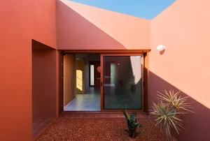 A modern architectural design featuring clay materials.