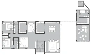 Modern interior design featuring a floor plan with neutral-colored walls and furniture.