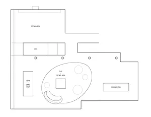 Floor plan of a modern living room with distinct zones for sitting, play, cooking, and dining.
