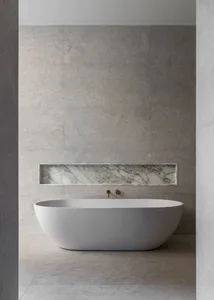 Modern minimalist bathroom featuring a freestanding bathtub with marble accents and a minimalist design.