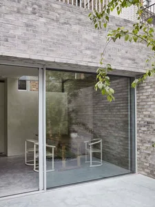 Modern exterior with a combination of brick and glass materials