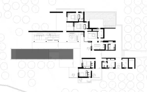 Black and white architectural drawing of a modern residential floor plan featuring extensive use of concrete materials.
