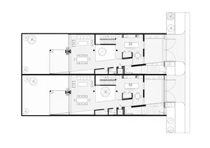 Modern townhouse layout with multiple rooms and outdoor spaces.