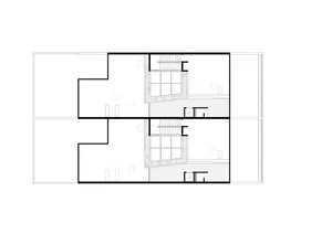A detailed architectural floor plan of a two-level office space, showcasing the layout of rooms and areas.