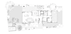 A modern house floor plan showing the layout of a residential home with detailed rooms and outdoor space.