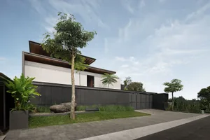 Modern residential home with a metallic façade, featuring sleek lines and a contemporary design.