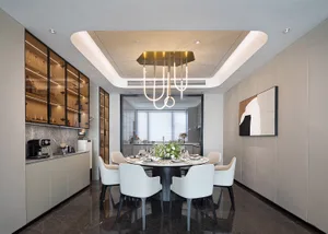 Modern dining room featuring marble and glass furniture.