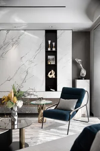 Modern living room with marble walls and wood accents
