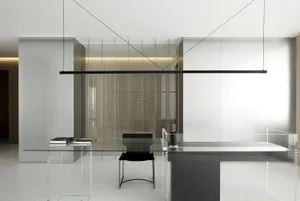 A sleek, modern office space featuring a transparent glass table and minimalist design.