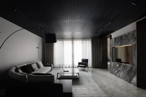 A modern minimalist living room featuring marble materials and a sleek, contemporary design.