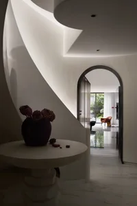 A modern interior design featuring marble elements.