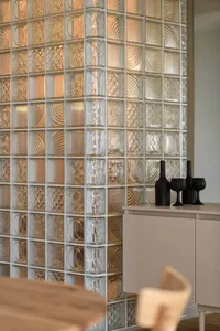 Modern kitchen with decorative glass block wall