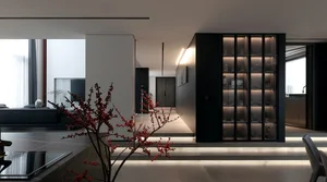 Modern living room with concrete flooring and minimalist design.