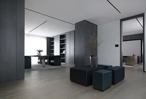 Modern minimalist living room with metallic furniture and bookshelves.