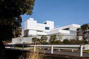 A modern exterior with precast concrete walls and a minimalist design.