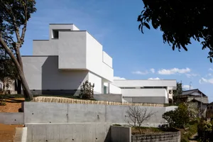 A modern house featuring concrete exterior walls