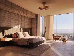 A modern minimalist bedroom with wooden flooring, glass walls, and fabric bedding.