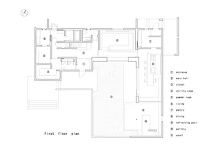 Floor plan of a residential building with labeled rooms and spaces.
