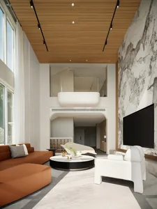 A contemporary living room featuring marble, concrete, and wooden elements.