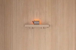 A minimalist ceramic teapot decoration on a wall shelf.