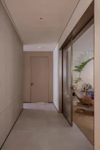 Modern interior design featuring a glass wall.
