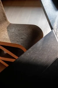 A modern chair made of paperboard.