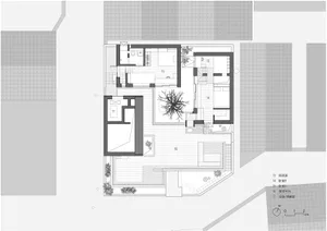A minimalist residential space with mixed media materials and a clear layout.