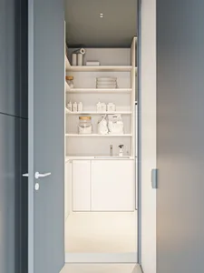 A minimalist storage room with white shelves holding various household items, set against a clean and modern background.