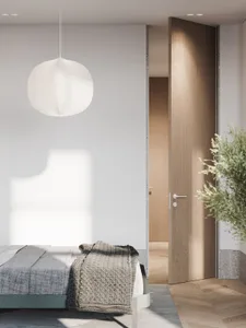 A modern bedroom featuring natural wood elements and a minimalist design.