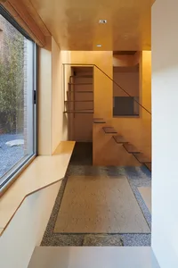 A modern interior with wooden elements and a minimalist aesthetic.