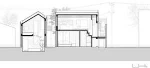 Cross-section of a modern house with a glass staircase on the left side