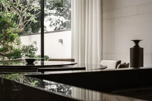 Modern kitchen with glass and marble finishes