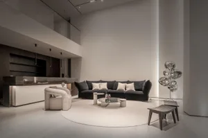 Modern living room featuring marble and metal materials.