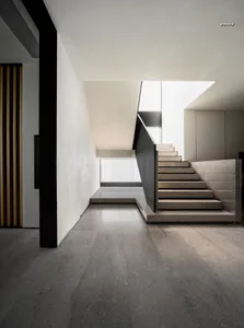 Concrete staircase with minimalist design in a modern interior space.