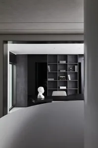 Modern office space with concrete, glass, and metal finishes.
