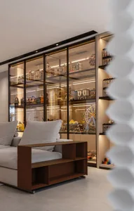 Modern minimalist living room featuring a glass wall display case showcasing various architectural models and a comfortable s