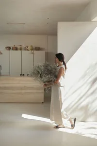 A minimalist interior space with neutral tones and natural light.