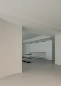 A modern interior space featuring concrete finishes.