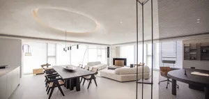 A modern living room with neutral tones and minimalistic design elements.