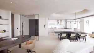 A modern residential kitchen with white marble countertops and white countertops.