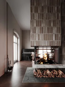 A modern living room with a brick fireplace, concrete floor, and marble accents.